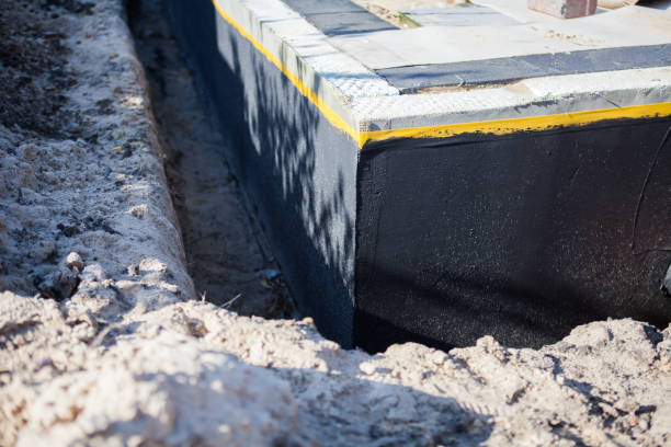 Professional Waterproofing technician working in Midway, GA